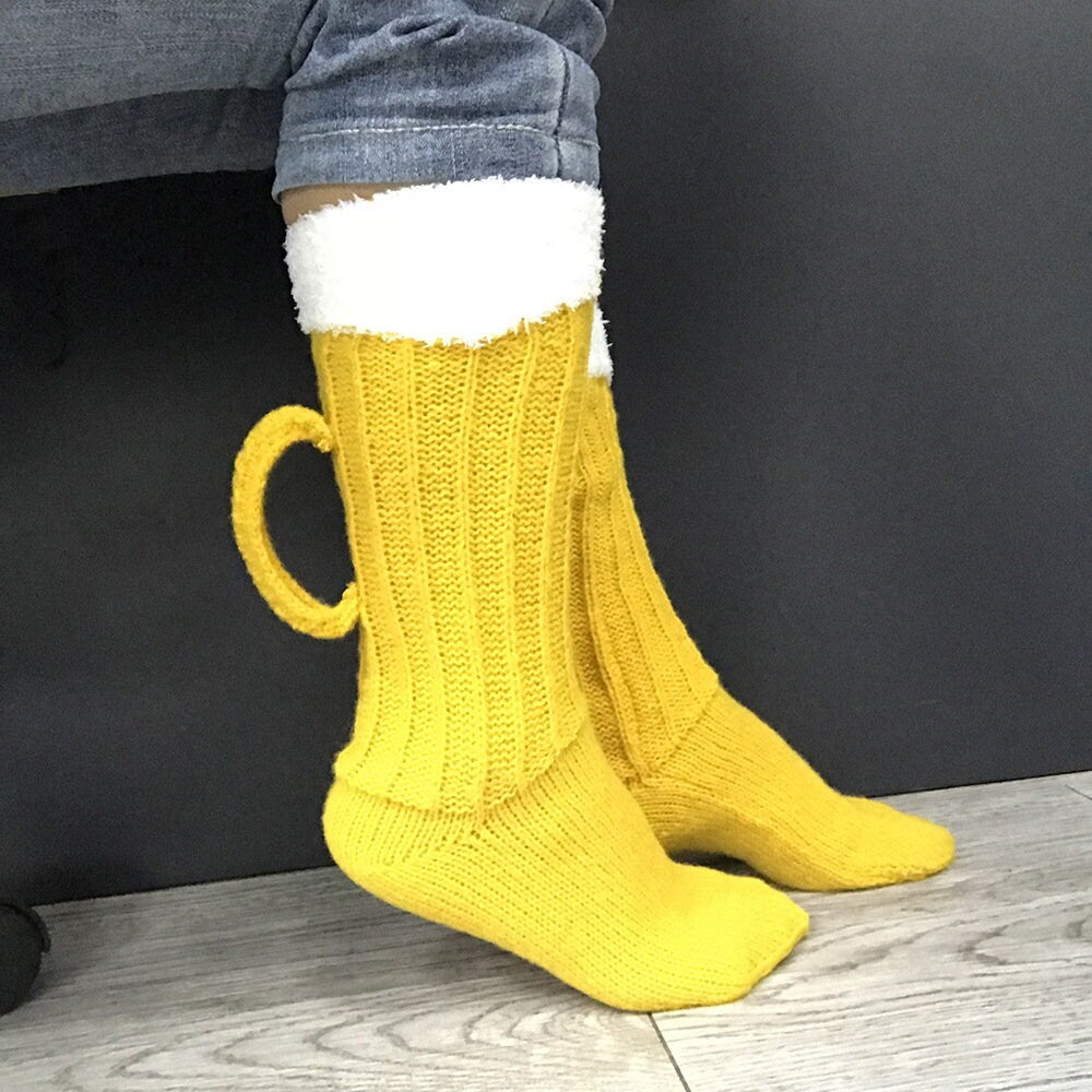 Yellow beer novelty socks, beer mug design, worn with jeans