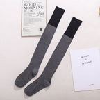 Gray cotton over the knee socks with black trim, flat lay showing the contrast cuff
