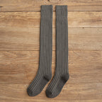Gray cotton thigh high socks, flat lay showing the ribbed knit