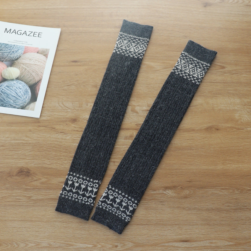 Dark gray diamond cable knit thigh high socks, flat lay showing the diamond pattern
