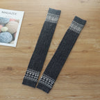 Dark gray diamond cable knit thigh high socks, flat lay showing the diamond pattern