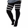 Black and white stripe extra long thigh high socks, worn with sock garters