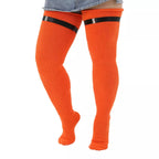Plain orange extra long thigh high socks, worn with sock garters