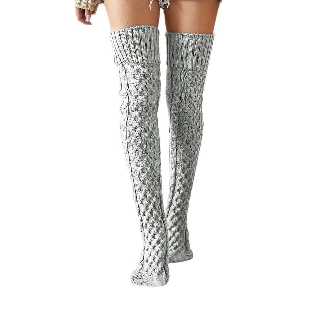 Gray fleece-lined knee high socks, full length on a white background