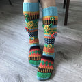 Blue and orange floral jacquard knee high socks, worn, colourful jacquard pattern