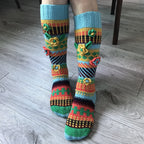 Blue and orange floral jacquard knee high socks, worn, colourful jacquard pattern