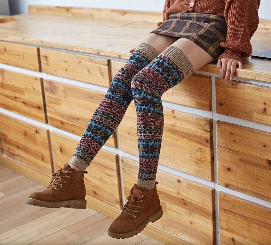 Apricot fuzzy thigh high leg warmers, worn with a plaid skirt and ankle boots