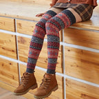Fair Isle fuzzy thigh high leg warmers, worn with a plaid skirt and ankle boots