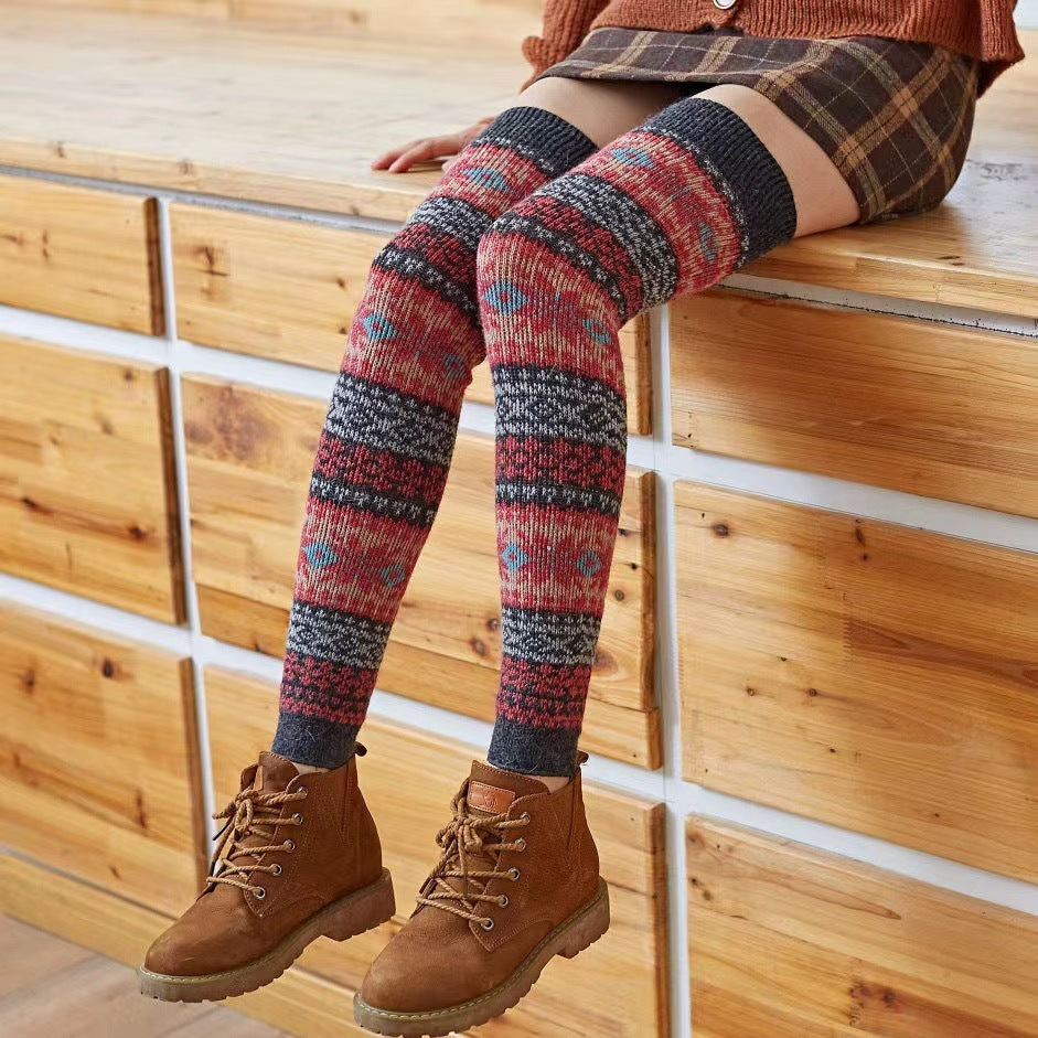 Fair Isle fuzzy thigh high leg warmers, worn with a plaid skirt and ankle boots