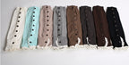 Lace trim button leg warmers in all colours, every colour laid out in a row