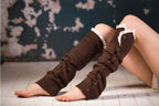 Coffee lace trim button leg warmers, worn sitting, scrunched at the ankle