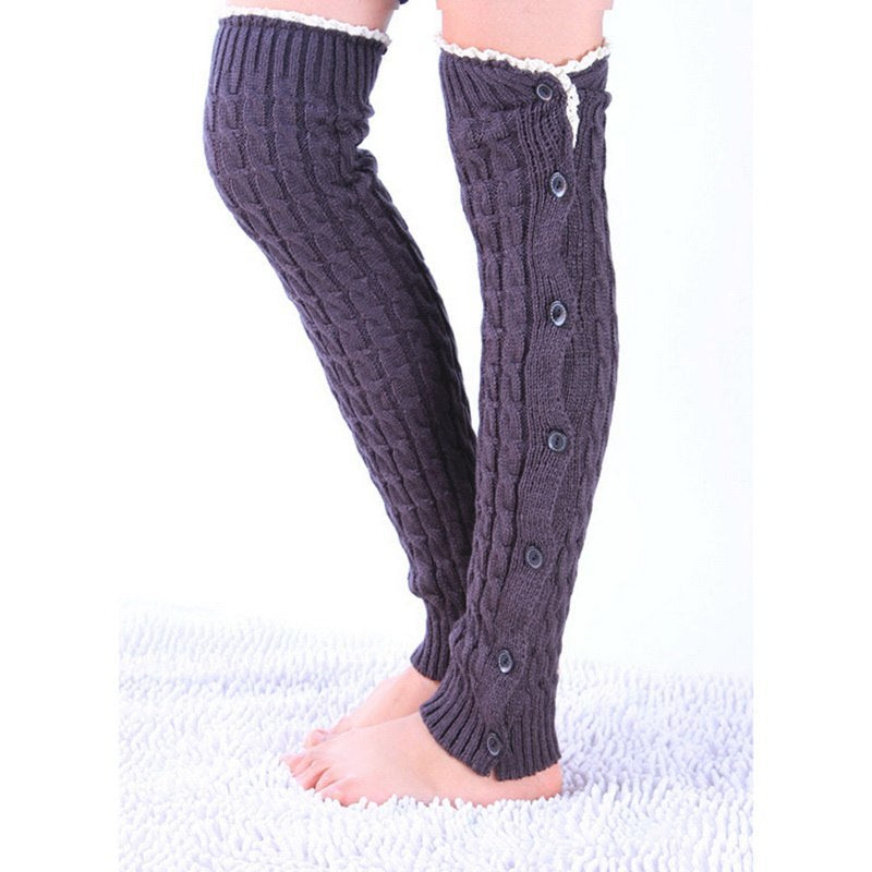 Dark gray lace trim button leg warmers, worn standing, full length