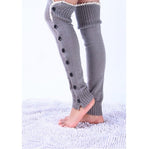 Light gray lace trim button leg warmers, worn standing, button front