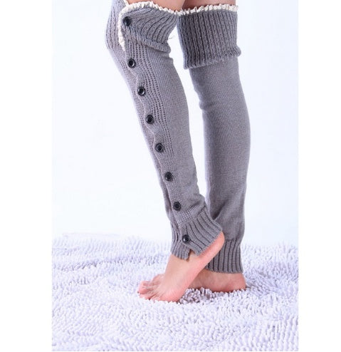 Light gray lace trim button leg warmers, worn standing, button front