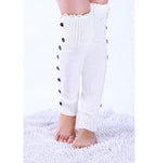White lace trim button leg warmers, worn standing, button front