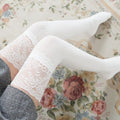 White lace top thigh high socks, lace top worn with a gray skirt