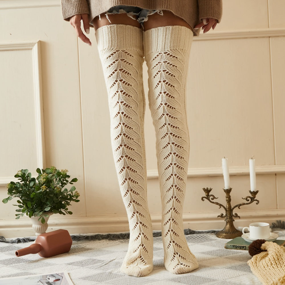 Cream mesh knit over the knee socks, worn standing, showing the open mesh knit