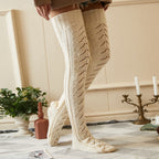 Cream mesh knit over the knee socks, side view of the open mesh knit