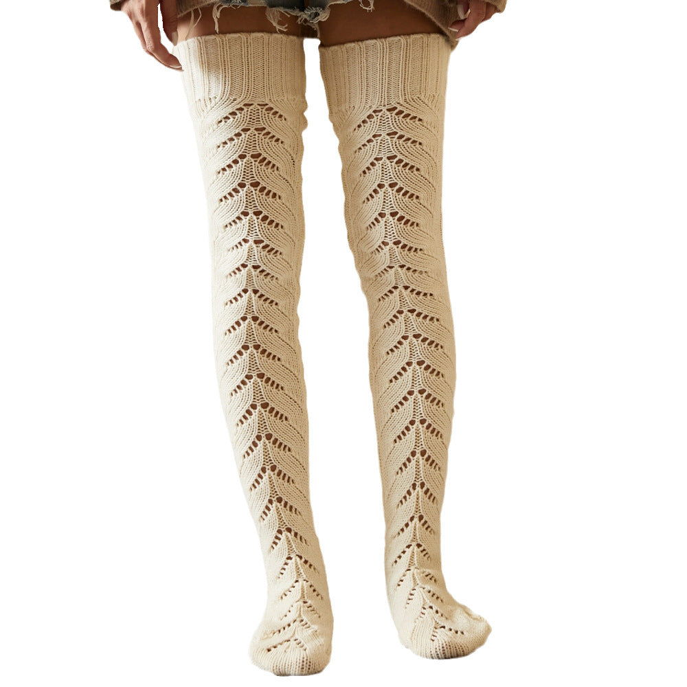 Cream mesh knit over the knee socks, front view on a white background