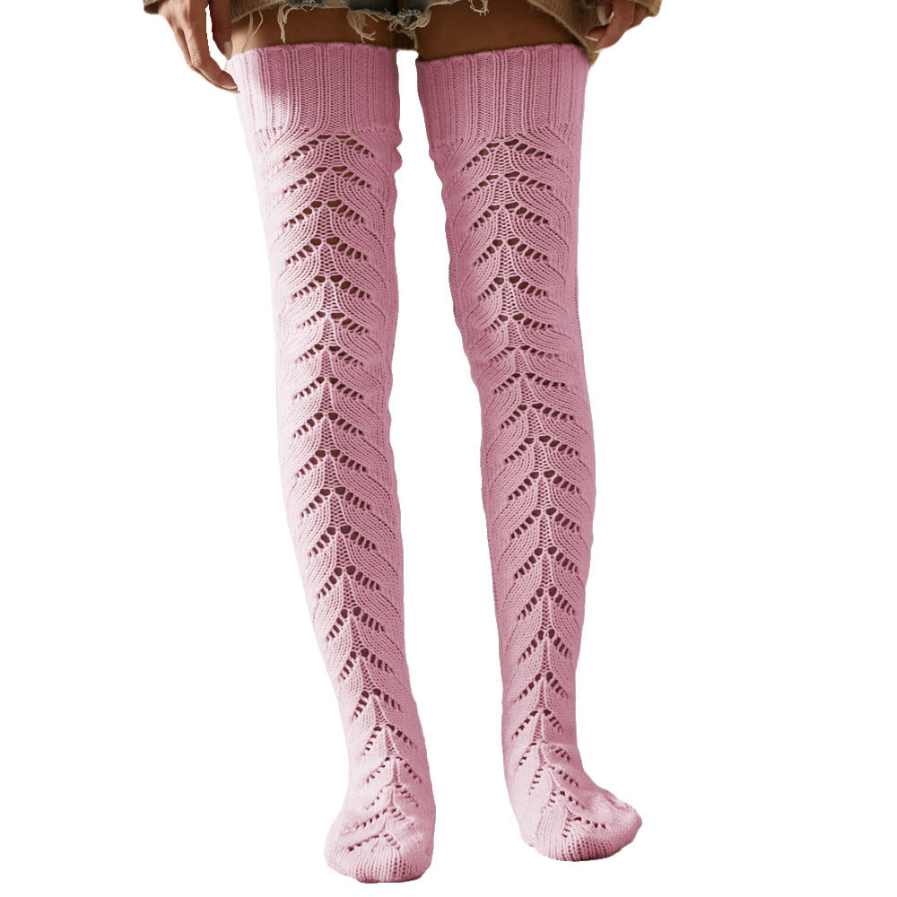 Pink mesh knit over the knee socks, back view on a white background