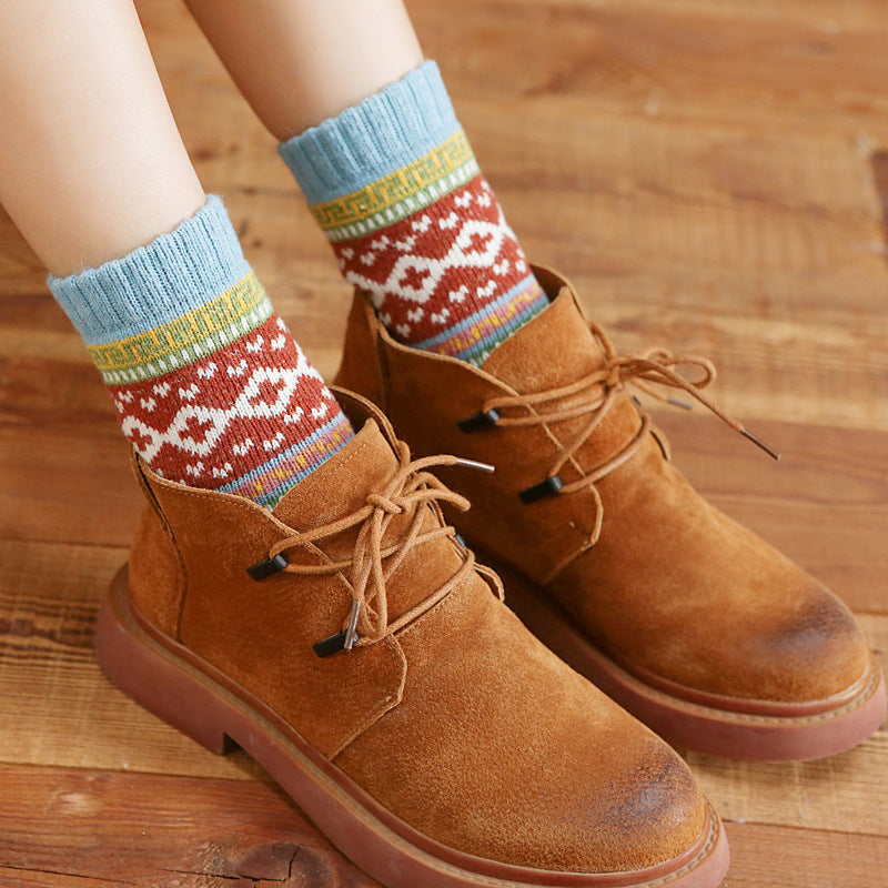 Nordic pattern wool blend socks, worn with brown lace-up boots