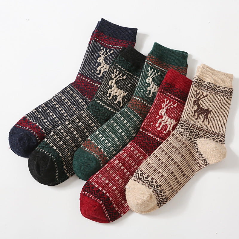 Nordic pattern wool blend socks in the reindeer design, 5-pair pack laid out