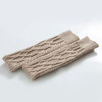 Beige over the knee leg warmers, flat lay of the cable knit pair
