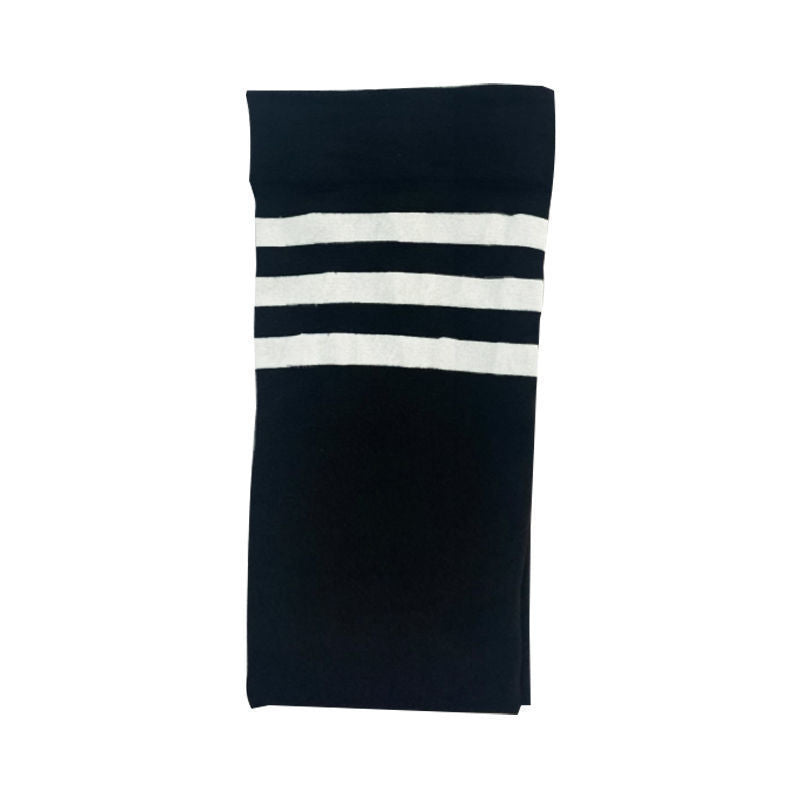 Black plus size over the knee socks with white stripes, flat lay of the striped top