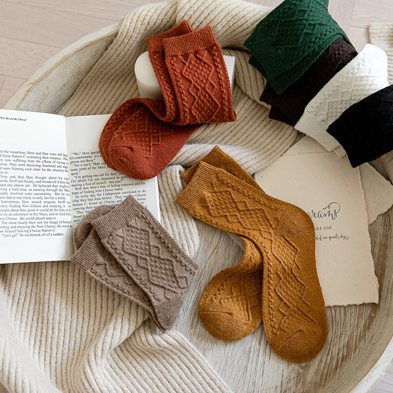 Ribbed wool blend crew socks in assorted colours, pairs laid out together