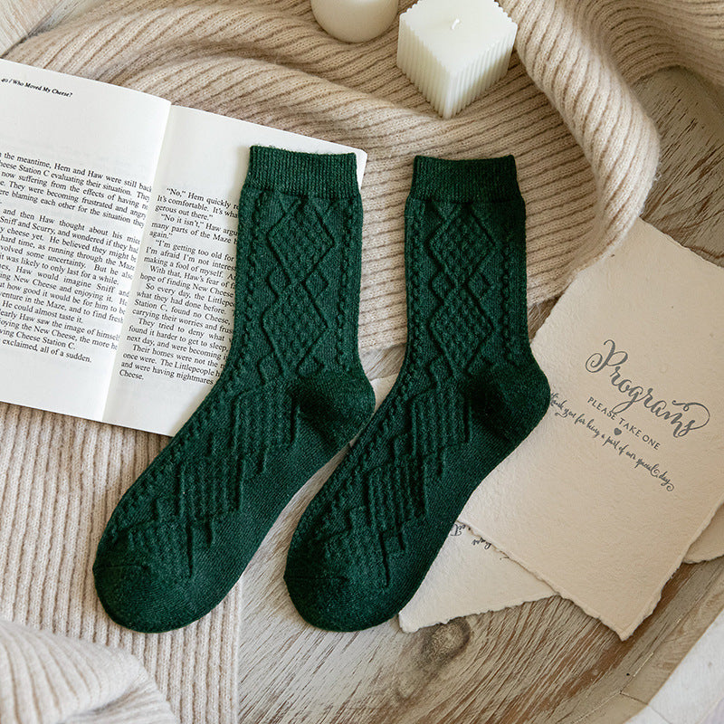 Dark green ribbed wool blend crew socks, close-up of the ribbed knit