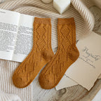 Yellow ribbed wool blend crew socks, close-up of the ribbed knit