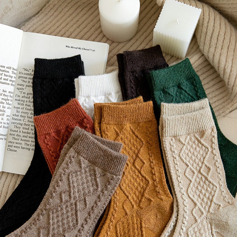 Soft knit crew socks in assorted colours, pairs laid out together