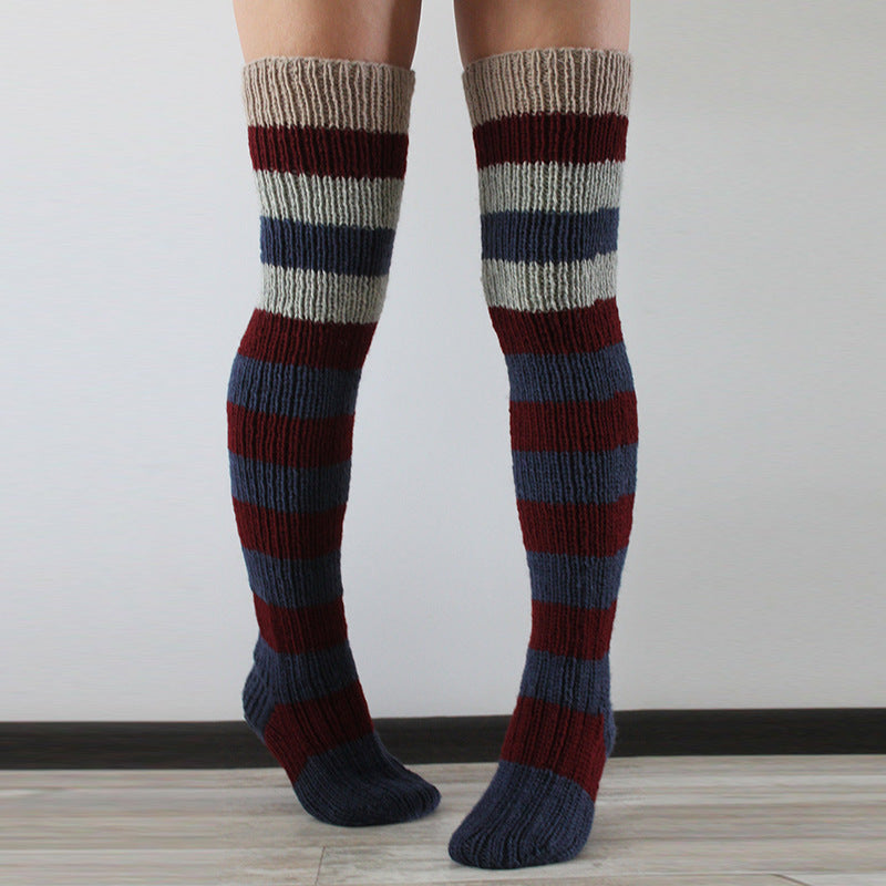 Navy and burgundy striped thigh high socks, front view of the knitted stripes