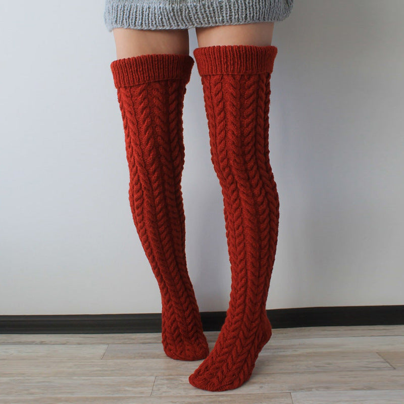 Deep red thick cable knit over the knee socks, front view of the chunky cable knit