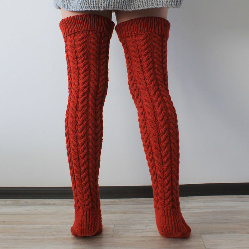 Deep red thick cable knit over the knee socks, front view of the chunky cable knit