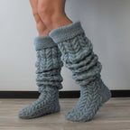 Gray thick cable knit over the knee socks, slouched down at the ankle