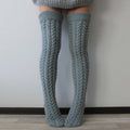 Gray thick cable knit over the knee socks, back view of the chunky cable knit